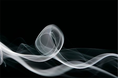 flowing - White smoke on black background Stock Photo - Premium Royalty-Free, Code: 622-06486747