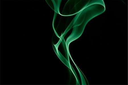 Green smoke on black background Stock Photo - Premium Royalty-Free, Code: 622-06486756