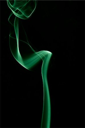 Green smoke on black background Stock Photo - Premium Royalty-Free, Code: 622-06486758