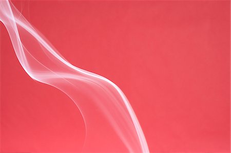 simsearch:622-06809285,k - White smoke on red background Stock Photo - Premium Royalty-Free, Code: 622-06486777