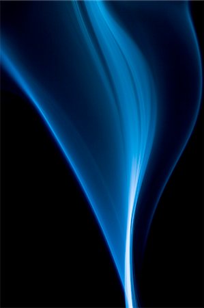 swirls - Blue smoke on black background Stock Photo - Premium Royalty-Free, Code: 622-06548912