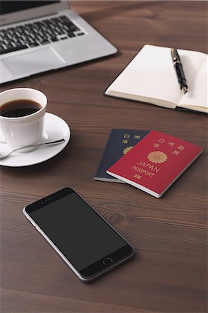 Smartphone coffee and passports Stock Photo - Premium Royalty-Free, Code: 622-08122904