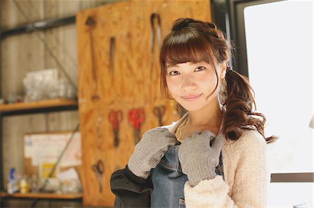 Young Japanese woman enjoying glass crafting workshop in Kawagoe, Japan Stock Photo - Premium Royalty-Free, Code: 622-08123461