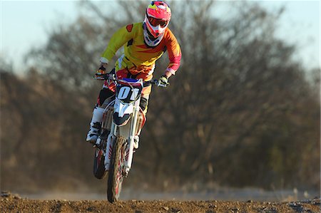 simsearch:622-08519684,k - Motocross biker on dirt track Stock Photo - Premium Royalty-Free, Code: 622-08355825