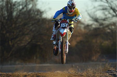 simsearch:622-08519684,k - Motocross biker on dirt track Stock Photo - Premium Royalty-Free, Code: 622-08355823