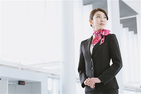 Japanese attractive flight attendant at the airport Stock Photo - Premium Royalty-Free, Code: 622-08482470