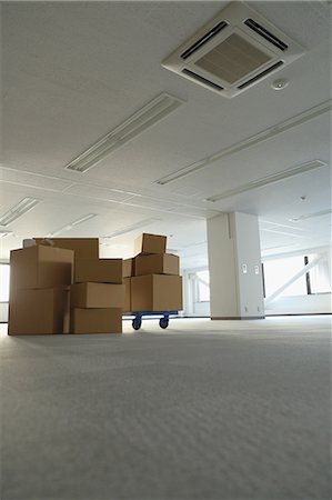 empty room interior view - Boxes in an empty office Stock Photo - Premium Royalty-Free, Code: 622-08578949