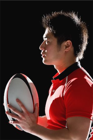 rugby players - Portrait of Japanese rugby player with ball Stock Photo - Premium Royalty-Free, Code: 622-08657716