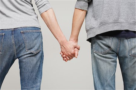 Male couple holding hands Stock Photo - Premium Royalty-Free, Code: 622-08657748