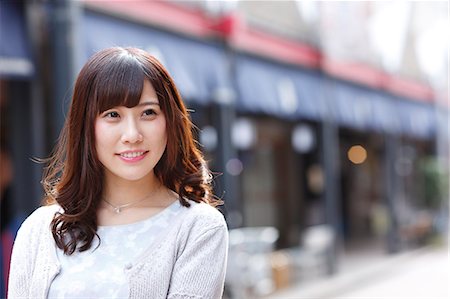 Fashionable Japanese woman at a traditional shopping street, Tokyo, Japan Stock Photo - Premium Royalty-Free, Code: 622-08893817