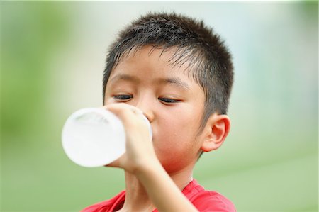 simsearch:400-05115517,k - Japanese kid at soccer field Stock Photo - Premium Royalty-Free, Code: 622-08893919