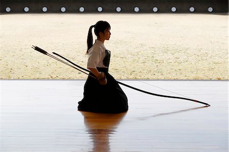 Japanese traditional archery athlete practicing Stock Photo - Premium Royalty-Free, Code: 622-09014462