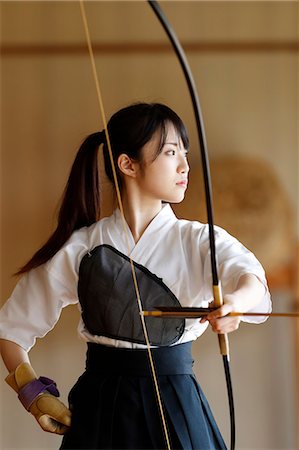 Japanese traditional archery athlete practicing Stock Photo - Premium Royalty-Free, Code: 622-09014534