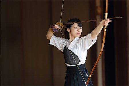 Japanese traditional archery athlete practicing Stock Photo - Premium Royalty-Free, Code: 622-09014539