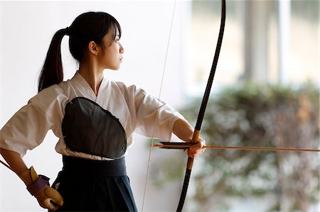 Japanese traditional archery athlete practicing Stock Photo - Premium Royalty-Free, Code: 622-09014532