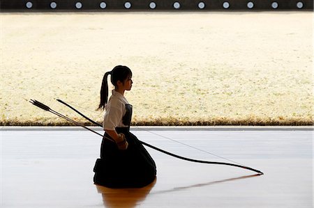 Japanese traditional archery athlete practicing Stock Photo - Premium Royalty-Free, Code: 622-09014557