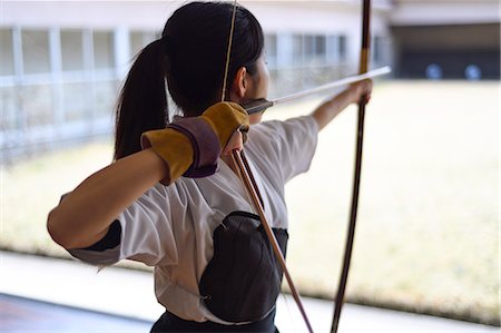 Japanese traditional archery athlete practicing Stock Photo - Premium Royalty-Free, Code: 622-09014577