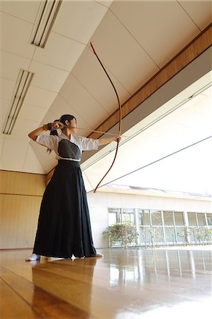 Japanese traditional archery athlete practicing Stock Photo - Premium Royalty-Free, Code: 622-09014628