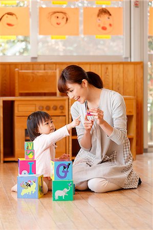 simsearch:622-08519691,k - Teacher with kid at Japanese kindergarten Stock Photo - Premium Royalty-Free, Code: 622-09056186