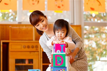 simsearch:622-08519691,k - Teacher with kid at Japanese kindergarten Stock Photo - Premium Royalty-Free, Code: 622-09056187