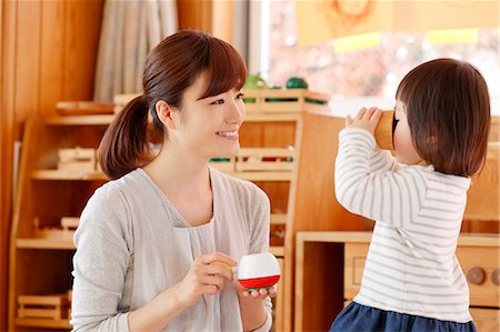 simsearch:622-08519691,k - Teacher with kid at Japanese kindergarten Stock Photo - Premium Royalty-Free, Code: 622-09056218