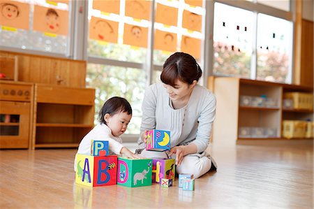 simsearch:622-08519691,k - Teacher with kid at Japanese kindergarten Stock Photo - Premium Royalty-Free, Code: 622-09056268