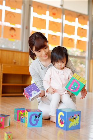 simsearch:622-08519691,k - Teacher with kid at Japanese kindergarten Stock Photo - Premium Royalty-Free, Code: 622-09056273