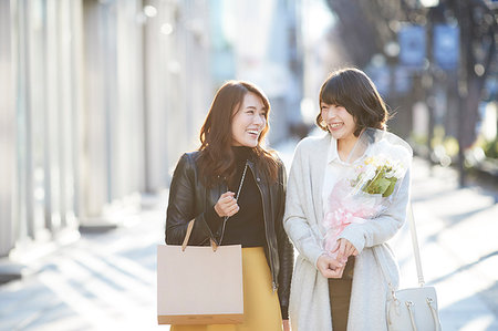 Japanese women window shopping downtown Tokyo Stock Photo - Premium Royalty-Free, Code: 622-09175633