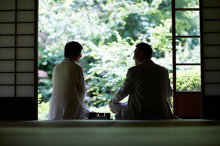 Japanese senior couple having fun at traditional inn Stock Photo - Premium Royalty-Free, Code: 622-09176166
