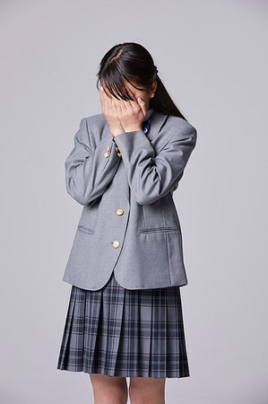 sad child indoors - Japanese junior high student Stock Photo - Premium Royalty-Free, Code: 622-09186940