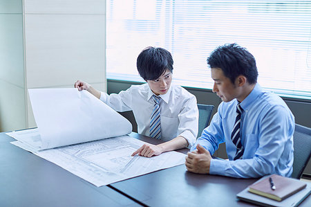 earnest - Japanese businesspeople in a meeting Stock Photo - Premium Royalty-Free, Code: 622-09180828