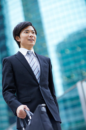 Japanese businessman downtown Tokyo Stock Photo - Premium Royalty-Free, Code: 622-09180905