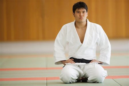 drilling (activity) - Judo Student Kneeling on Mats Foto de stock - Sin royalties Premium, Código: 622-00947288
