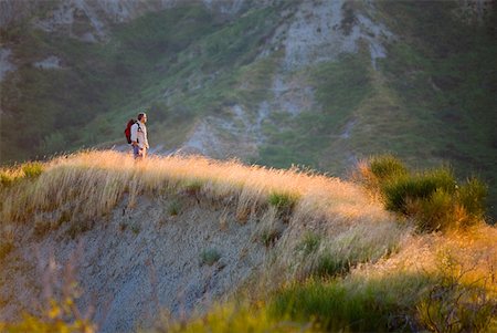 Backpacker on hike Stock Photo - Premium Royalty-Free, Code: 622-01080639