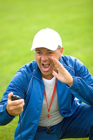 stop watch - Trainer with timer Stock Photo - Premium Royalty-Free, Code: 622-01080659