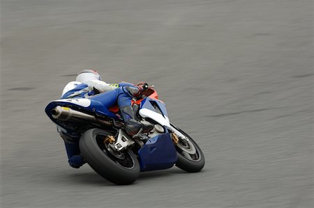 Racing motor bike cornering at speed Stock Photo - Premium Royalty-Free, Code: 622-01080686