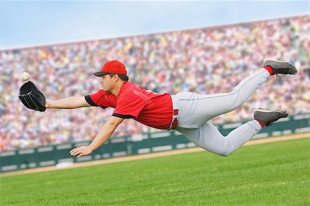 diving (not water) - Diving catch Stock Photo - Premium Royalty-Free, Code: 622-01283649