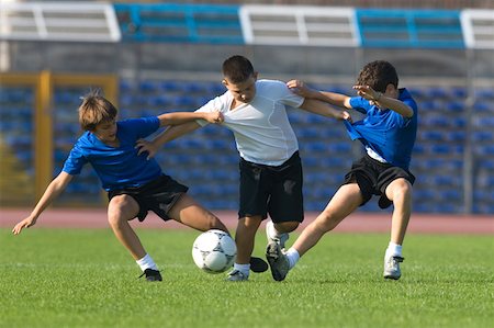 Boy splitting the defence Stock Photo - Premium Royalty-Free, Code: 622-01283742