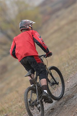 red trail - Mountain Biker Stock Photo - Premium Royalty-Free, Code: 622-01572133