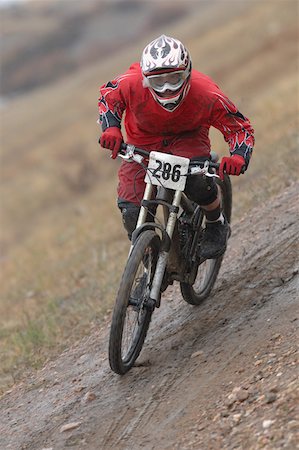 red trail - Mountain Biker Going Downhill Stock Photo - Premium Royalty-Free, Code: 622-01572144