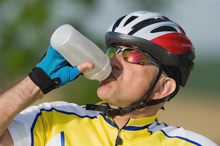 Cyclist drinking water,  close-up Stock Photo - Premium Royalty-Free, Code: 622-02198568