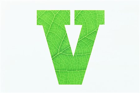 Green Alphabet V on White Background Stock Photo - Premium Royalty-Free, Code: 622-02757708