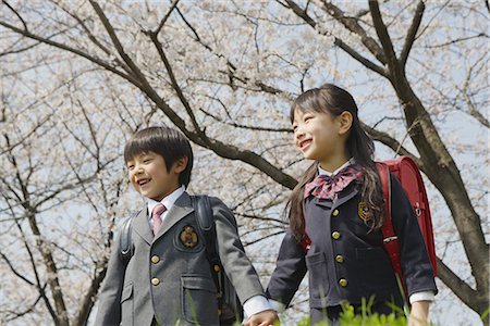 schoolmate - Schoolmate holding hands and going to school Stock Photo - Premium Royalty-Free, Code: 622-02758443