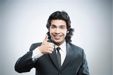 simsearch:6107-06117573,k - Businessman showing thumbs up Stock Photo - Premium Royalty-Free, Code: 630-06724714