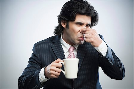 funny pictures indians people - This coffee tastes bad Stock Photo - Premium Royalty-Free, Code: 630-06724741