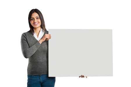 sign (any sort of textual, symbolic, printed or blank sign) - Businesswoman showing a blank placard Stock Photo - Premium Royalty-Free, Code: 630-06724813