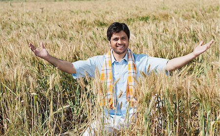 farm images of happy people - Farmer gesturing in the field, Sohna, Haryana, India Stock Photo - Premium Royalty-Free, Code: 630-06724958