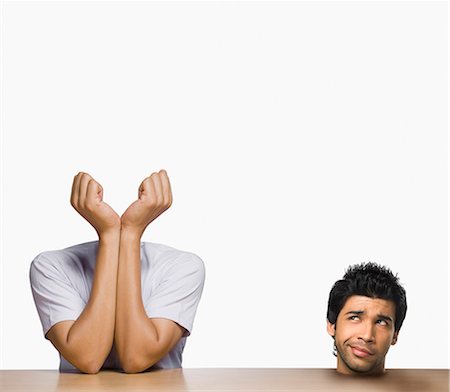 funny pictures indians people - Composite image of a headless man with his head placed on a table Stock Photo - Premium Royalty-Free, Code: 630-06721851