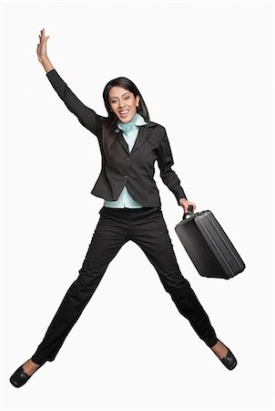 Businesswoman jumping Stock Photo - Premium Royalty-Free, Code: 630-06722008