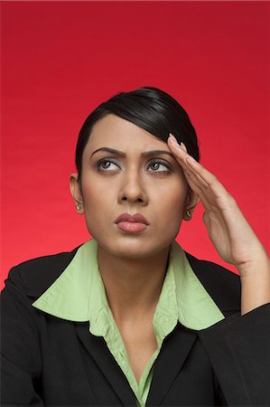 simsearch:6108-06167824,k - Businesswoman suffering from a headache Stock Photo - Premium Royalty-Free, Code: 630-06722034